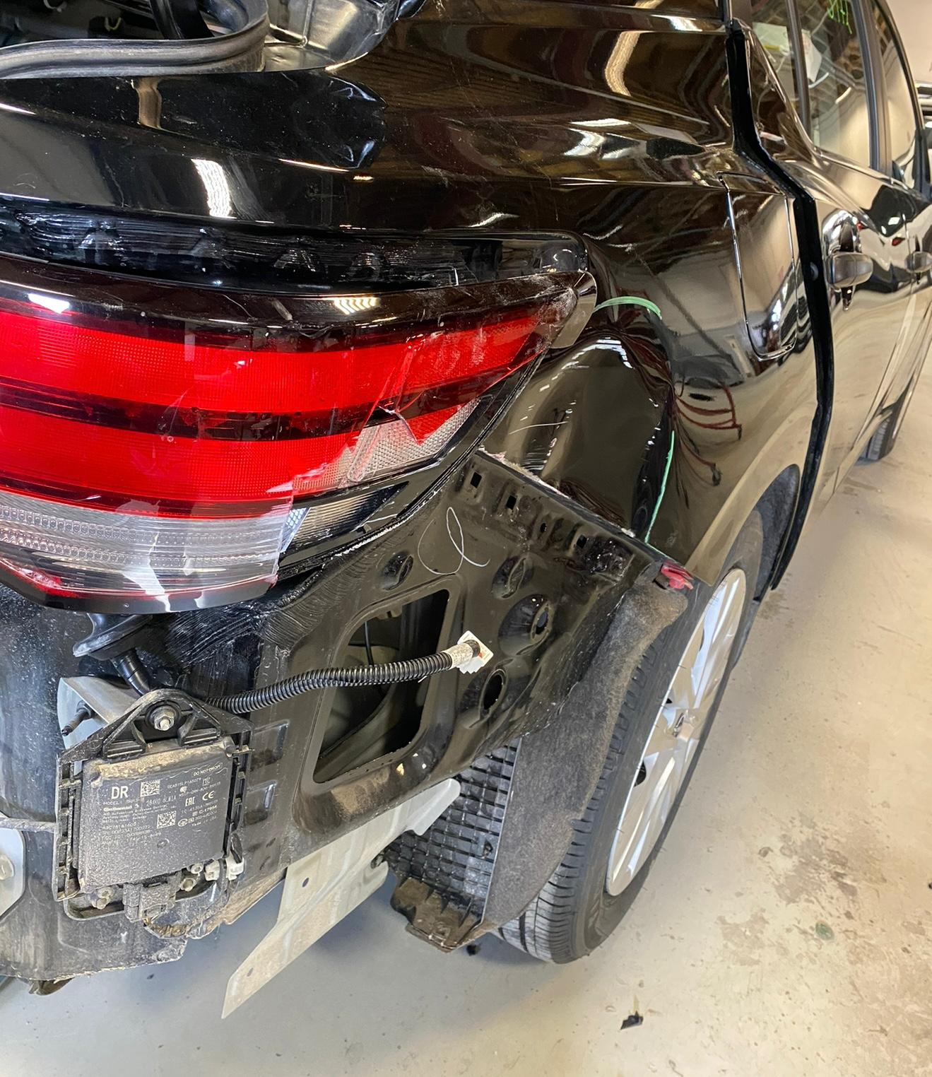 Vehicle before collision repair on rear quarter panel
